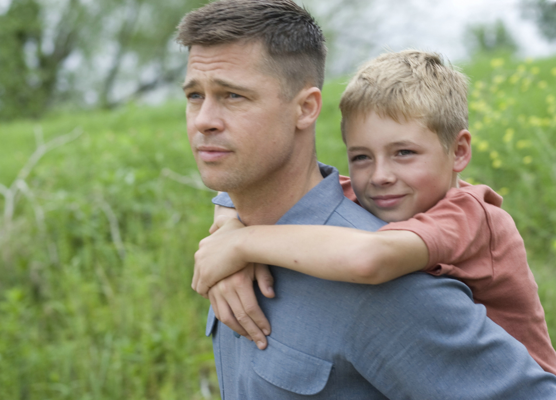 Still of Brad Pitt and Laramie Eppler in The Tree of Life (2011)