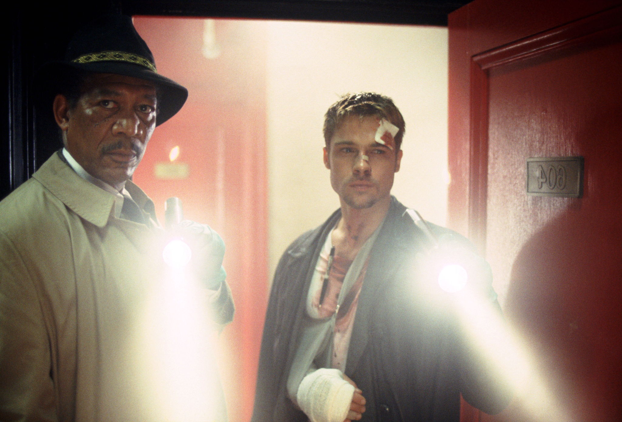 Still of Brad Pitt and Morgan Freeman in Se7en (1995)