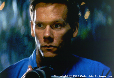 Kevin Bacon co-stars as Ray Duquette