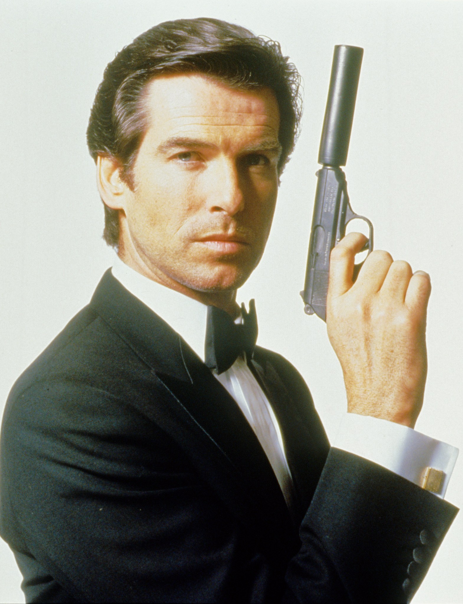 Still of Pierce Brosnan in Auksine Akis (1995)