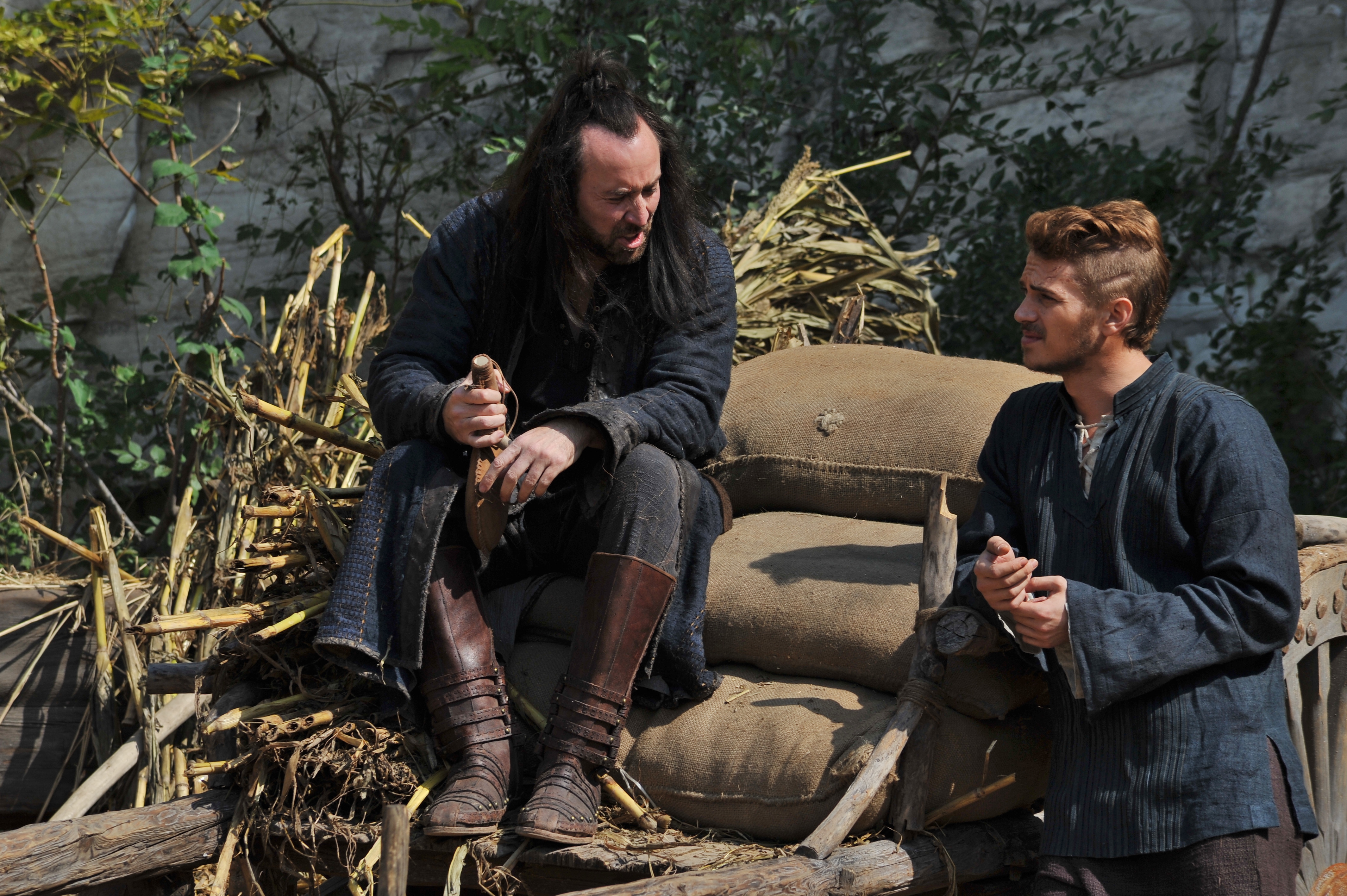 Still of Nicolas Cage and Hayden Christensen in Outcast (2014)