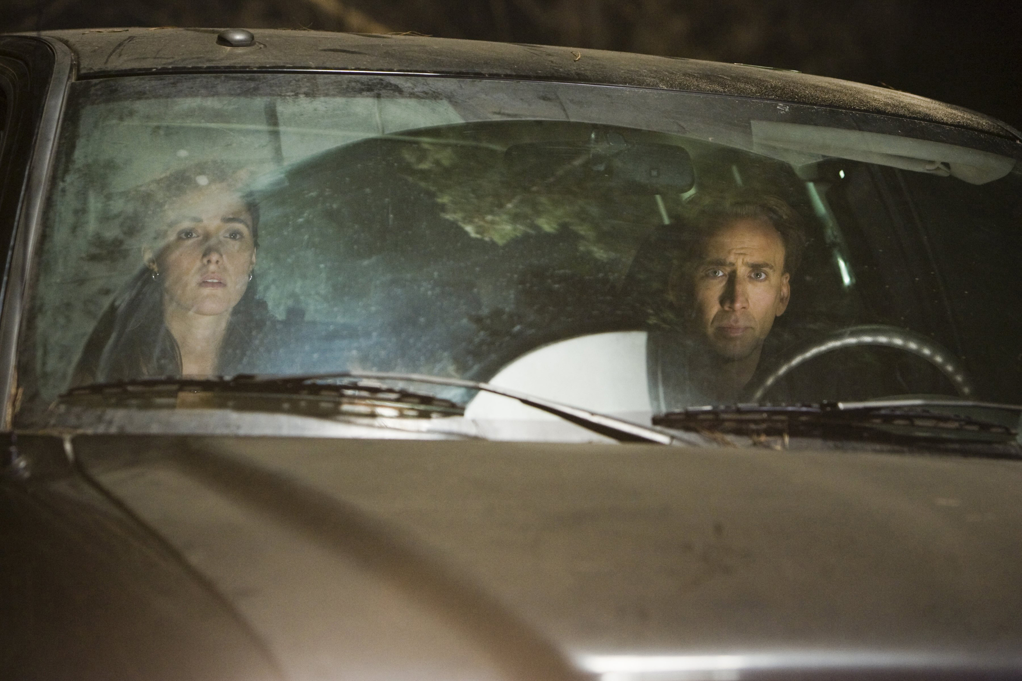 Still of Nicolas Cage and Rose Byrne in Suvokimas (2009)