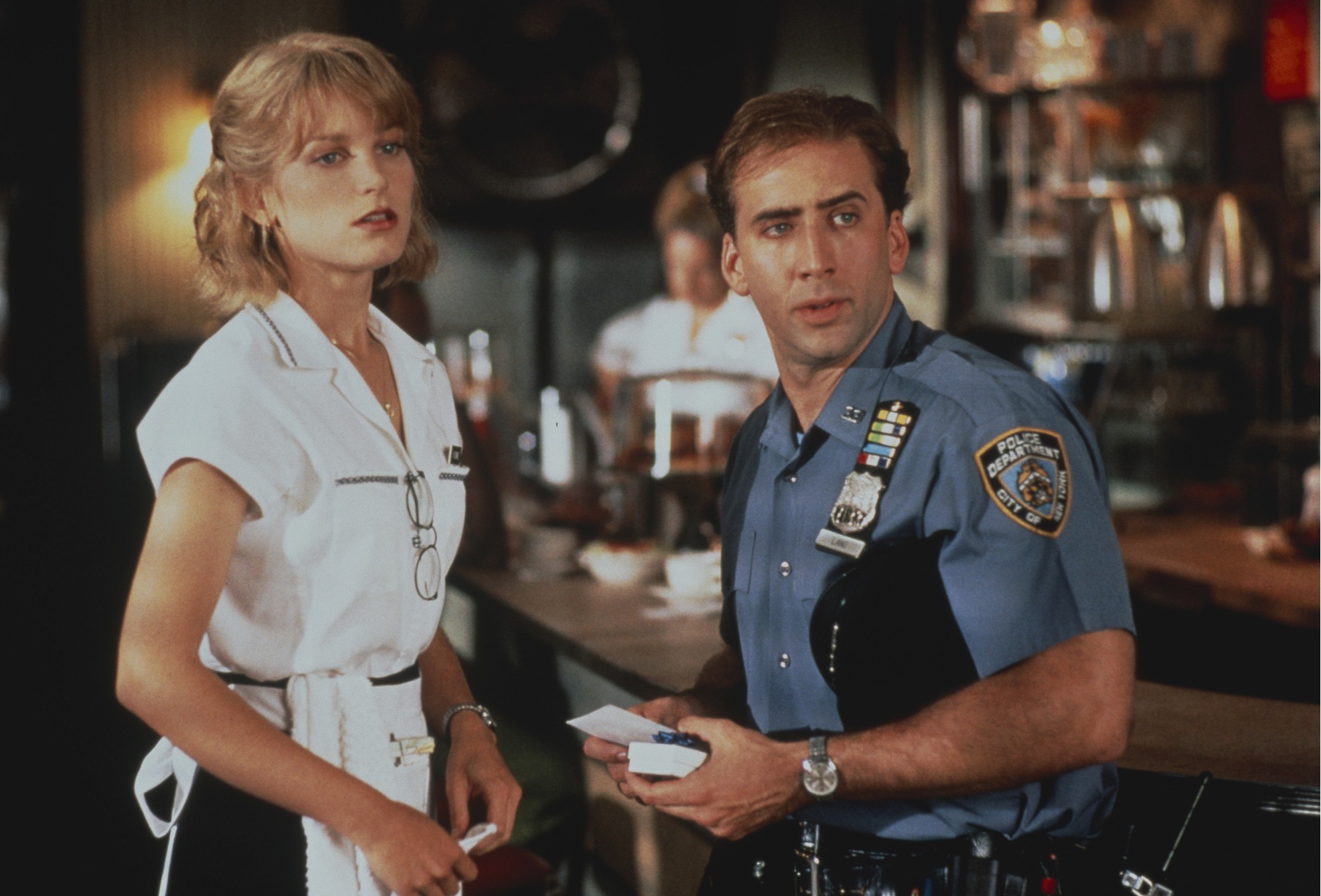 Still of Nicolas Cage and Bridget Fonda in It Could Happen to You (1994)