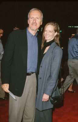 James Cameron and Suzy Amis at event of End of Days (1999)