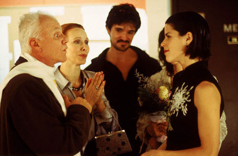 Still of Neve Campbell, Malcolm McDowell and Domingo Rubio in The Company (2003)