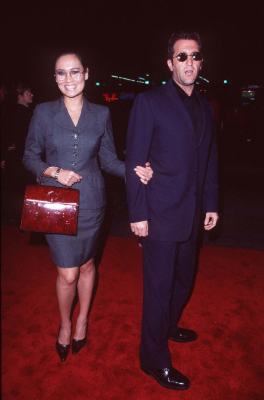 Tia Carrere and Elie Samaha at event of Titanikas (1997)