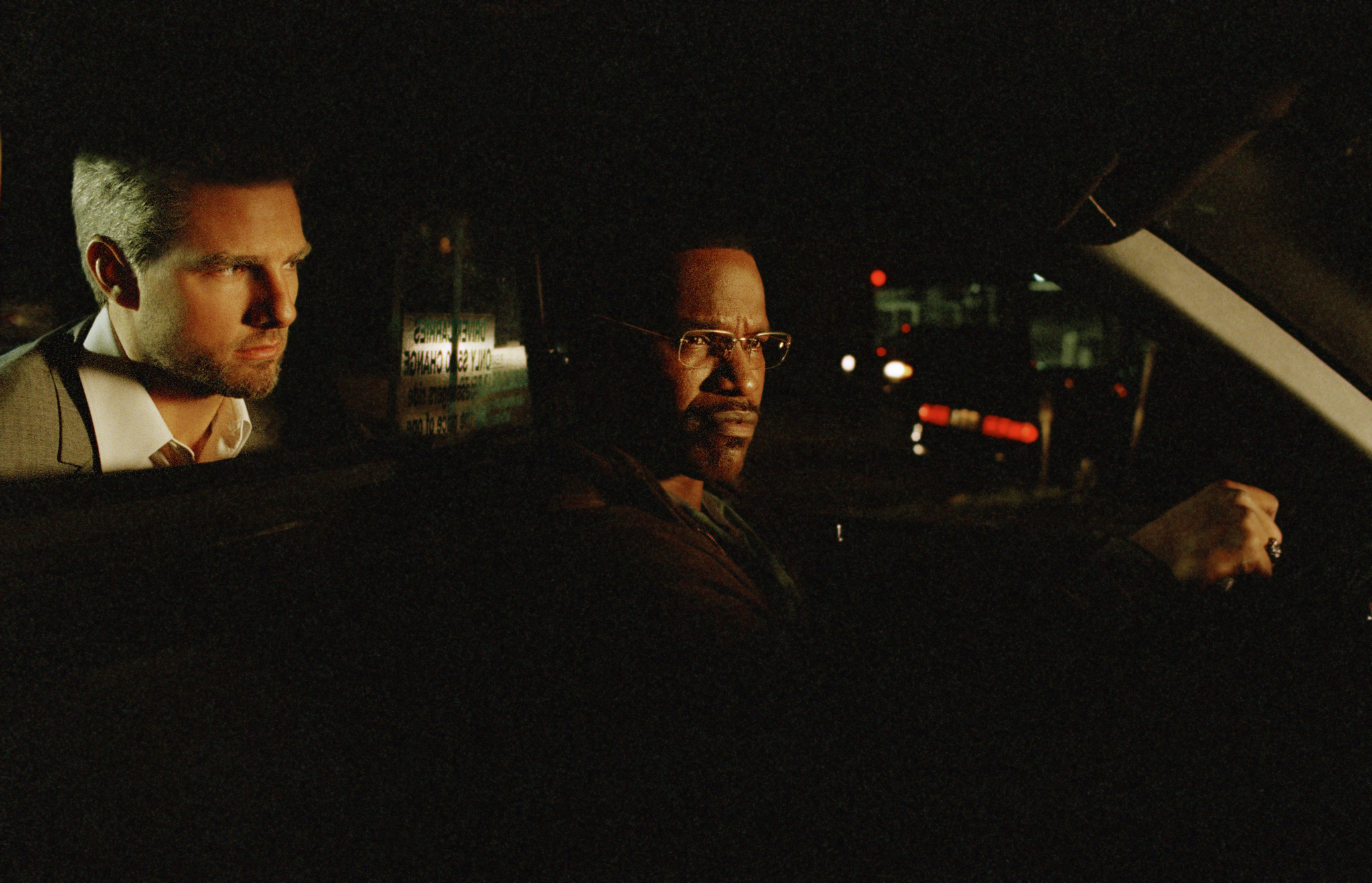 Still of Tom Cruise and Jamie Foxx in Nakties ikaitas (2004)