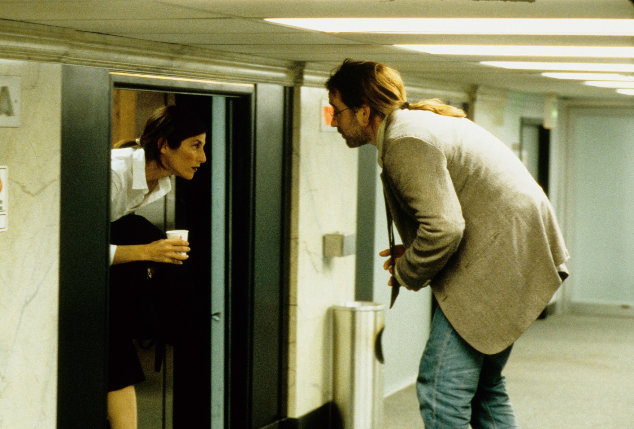 Still of John Cusack and Catherine Keener in Being John Malkovich (1999)