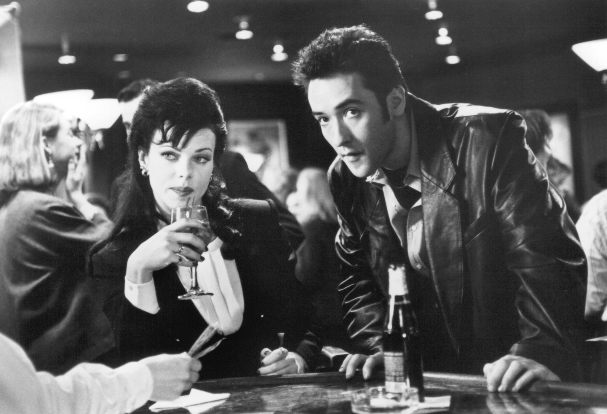 Still of John Cusack and Debi Mazar in Money for Nothing (1993)