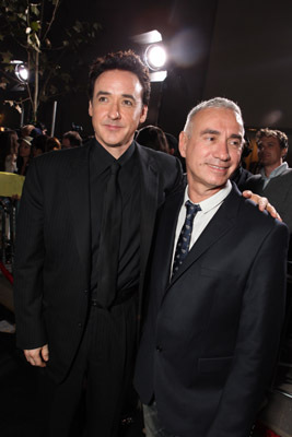John Cusack and Roland Emmerich at event of 2012 (2009)