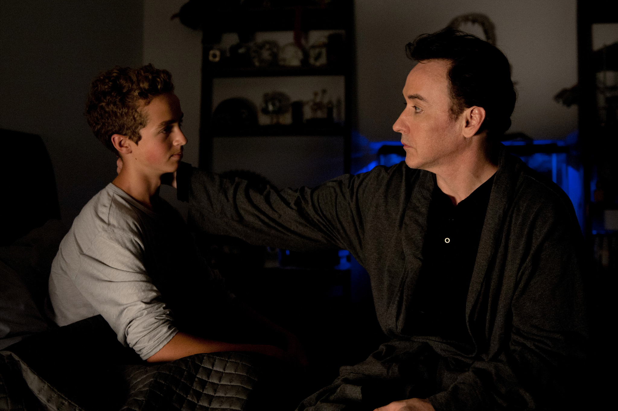 John Cusack and Evan Bird in Maps to the Stars (2014)