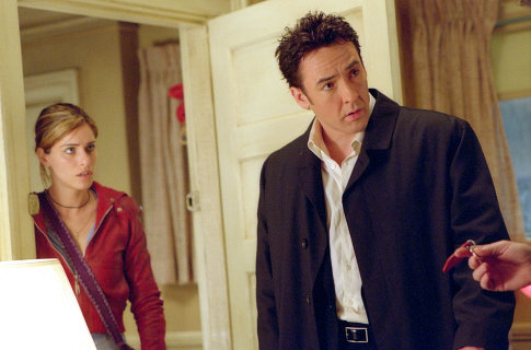 Still of John Cusack and Amanda Peet in Identity (2003)