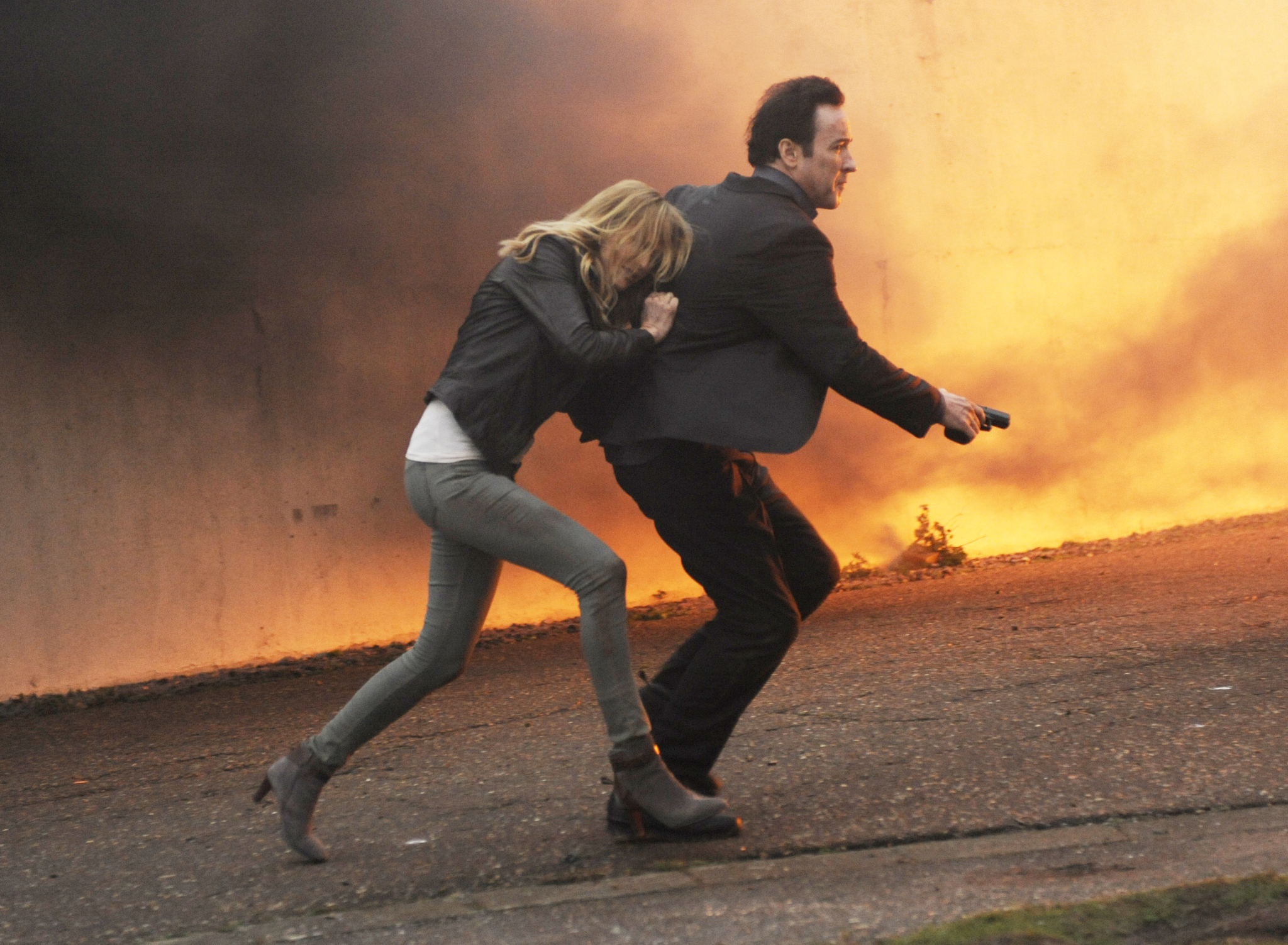 Still of John Cusack and Malin Akerman in The Numbers Station (2013)