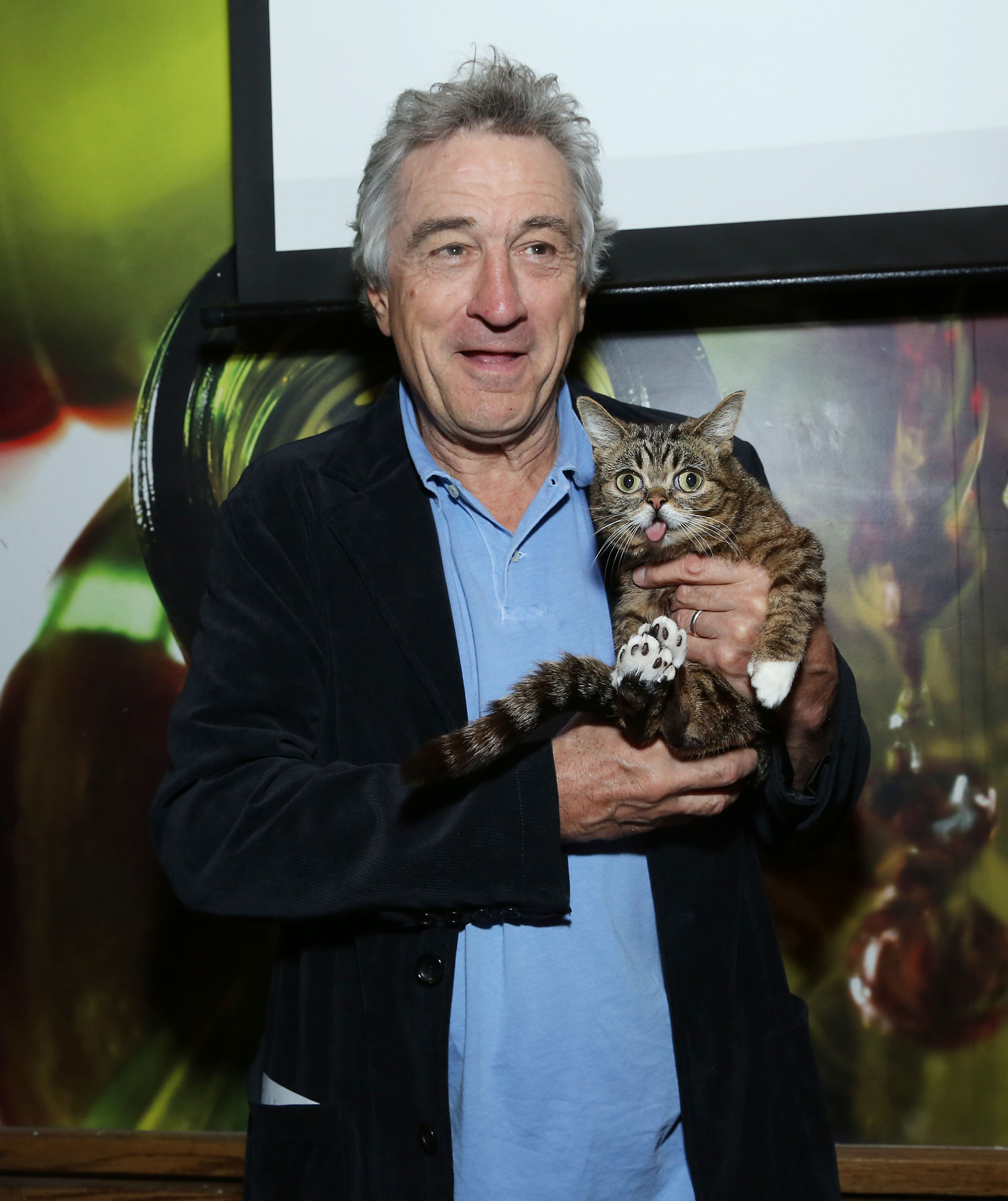 Robert De Niro and cat Lil Bub attend the Directors Brunch during the 2013 Tribeca Film Festival on April 23, 2013 in New York City.