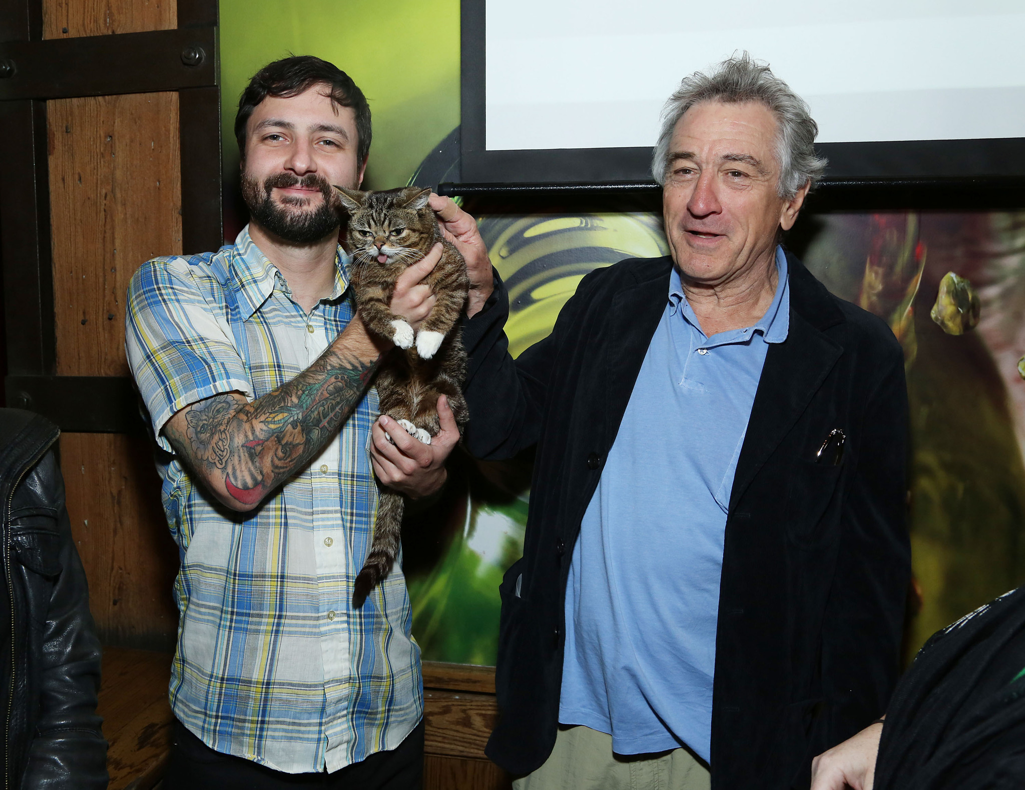 Robert De Niro and cat Lil Bub attend the Directors Brunch during the 2013 Tribeca Film Festival on April 23, 2013 in New York City.