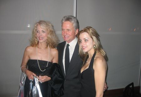 Joycelyn Engle, Michael Douglas, and Julianne Michelle at Steven Spielberg's Children at Heart Celebrity Auction/Dinner Gala.