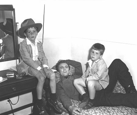 Kirk Douglas with his sons Michael and Joel on the set of 