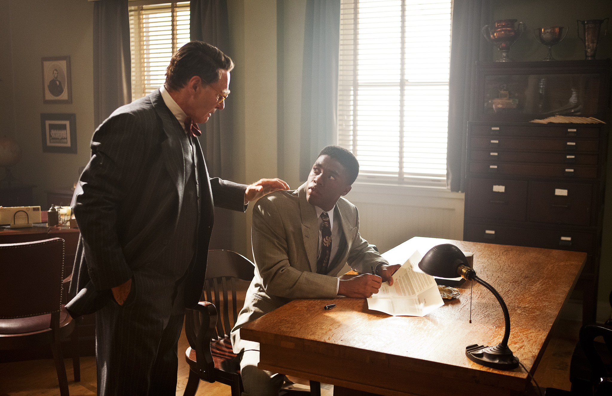 Still of Harrison Ford and Chadwick Boseman in 42 (2013)