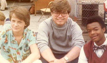 John Richard Petersen (center) with Michael J. Fox and Todd Bridges on the set of 