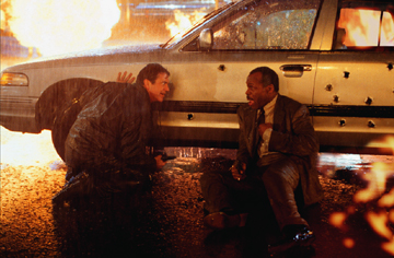 Riggs and Murtaugh try to avoid being shot