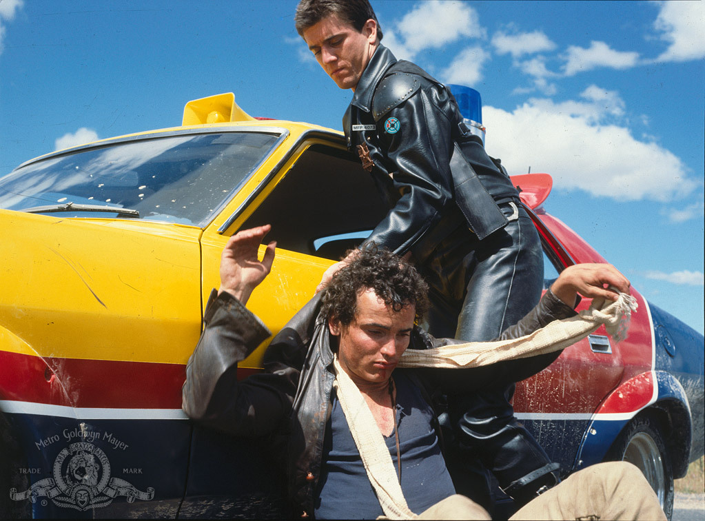 Still of Mel Gibson and Tim Burns in Mad Max (1979)