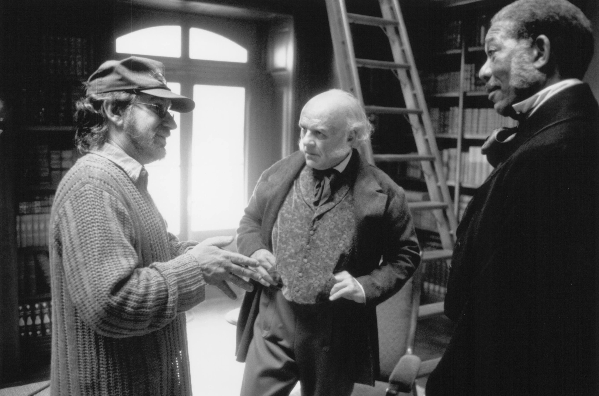 Still of Morgan Freeman, Anthony Hopkins and Steven Spielberg in Amistad (1997)