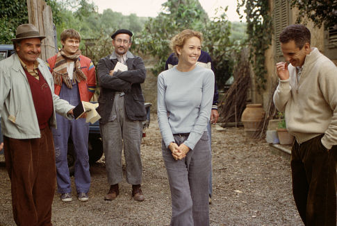 Frances (Diane Lane, second from right) experiences the agony and the ecstasy of remodeling her Tuscan villa with the help of contractor Nino (Massimo Sarchielli, far left), handymen Pawel (Pawel Szajda, second from left) and Jerzy (Valentine Pelka, third from right), and friend and realtor Signor Martini (Vincent Riotta, far right)
