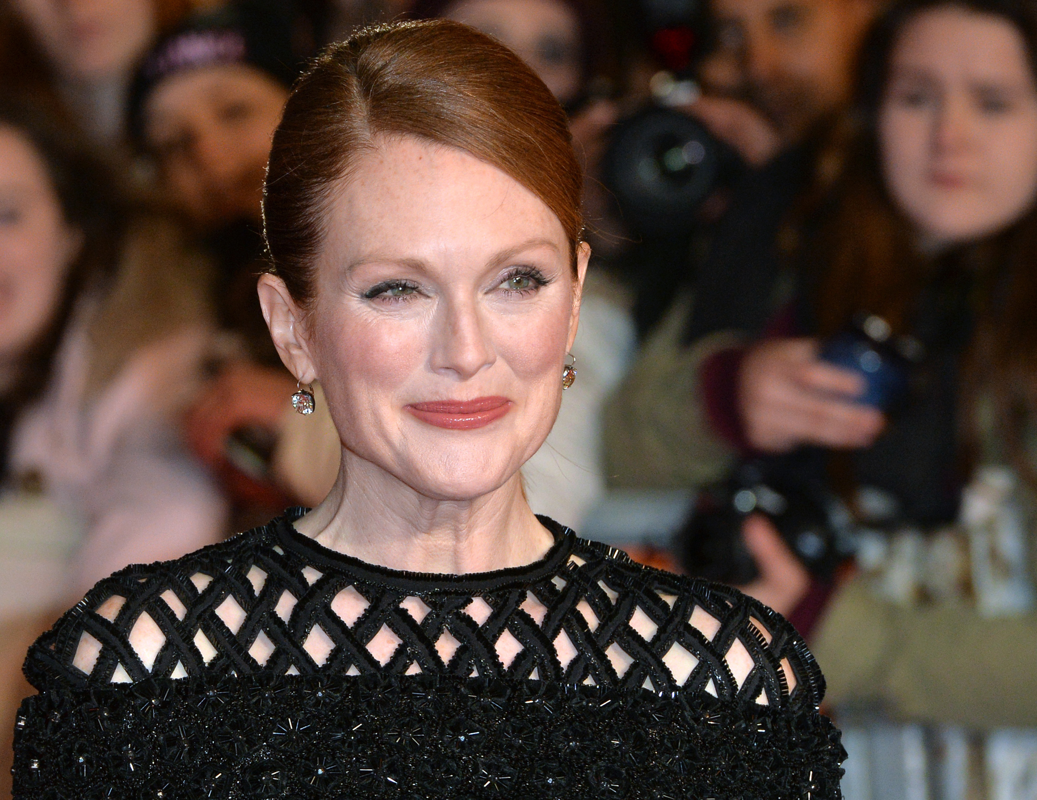 Julianne Moore at event of Bado zaidynes: Strazdas giesmininkas. 1 dalis (2014)