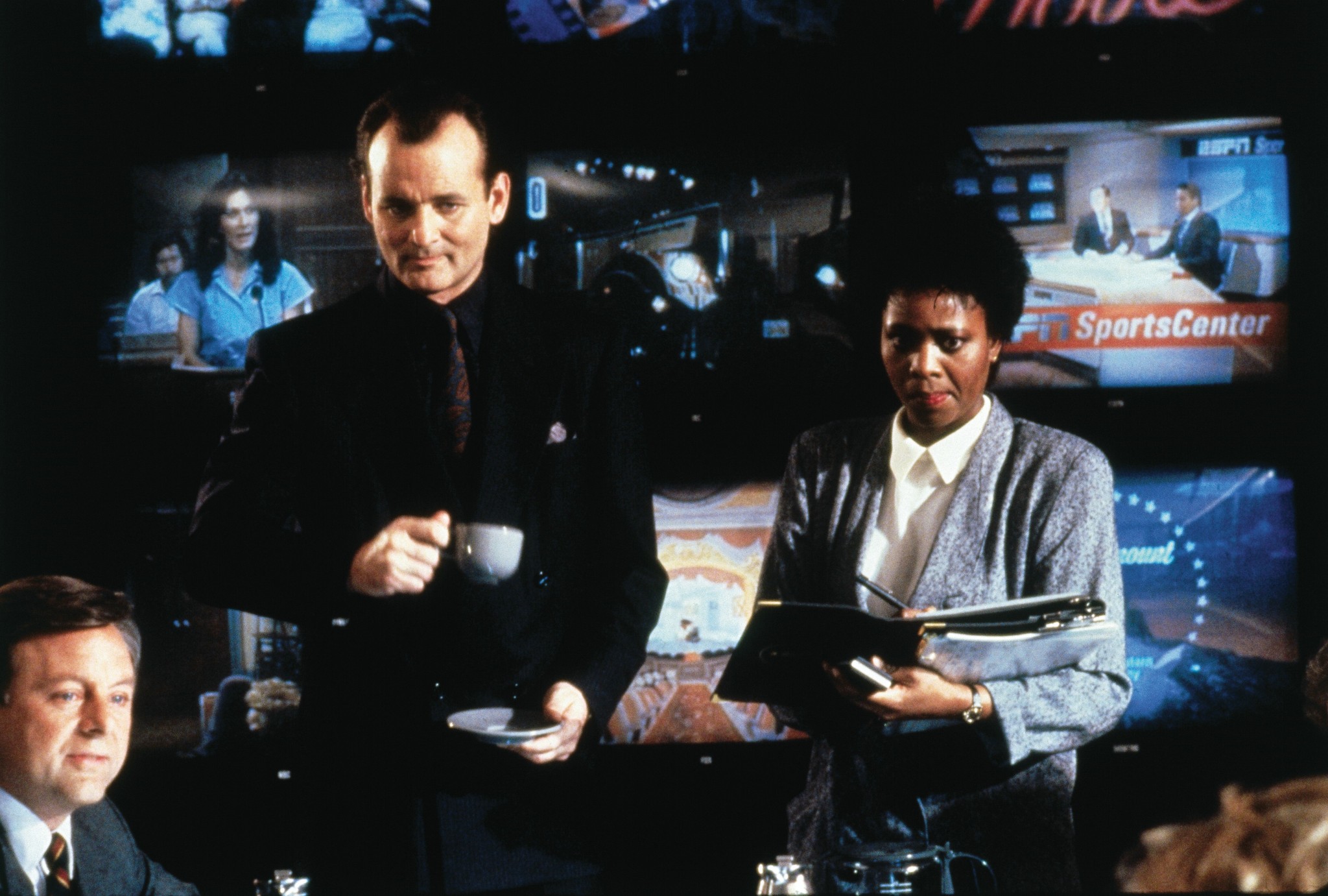 Still of Bill Murray and Alfre Woodard in Scrooged (1988)