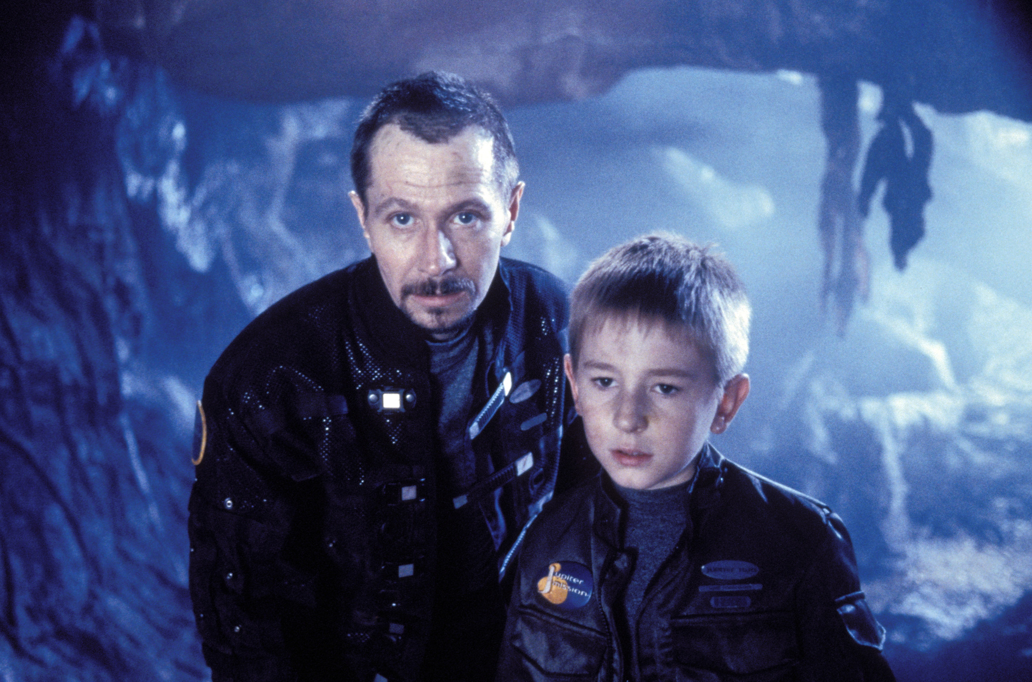 Still of Gary Oldman and Jack Johnson in Lost in Space (1998)