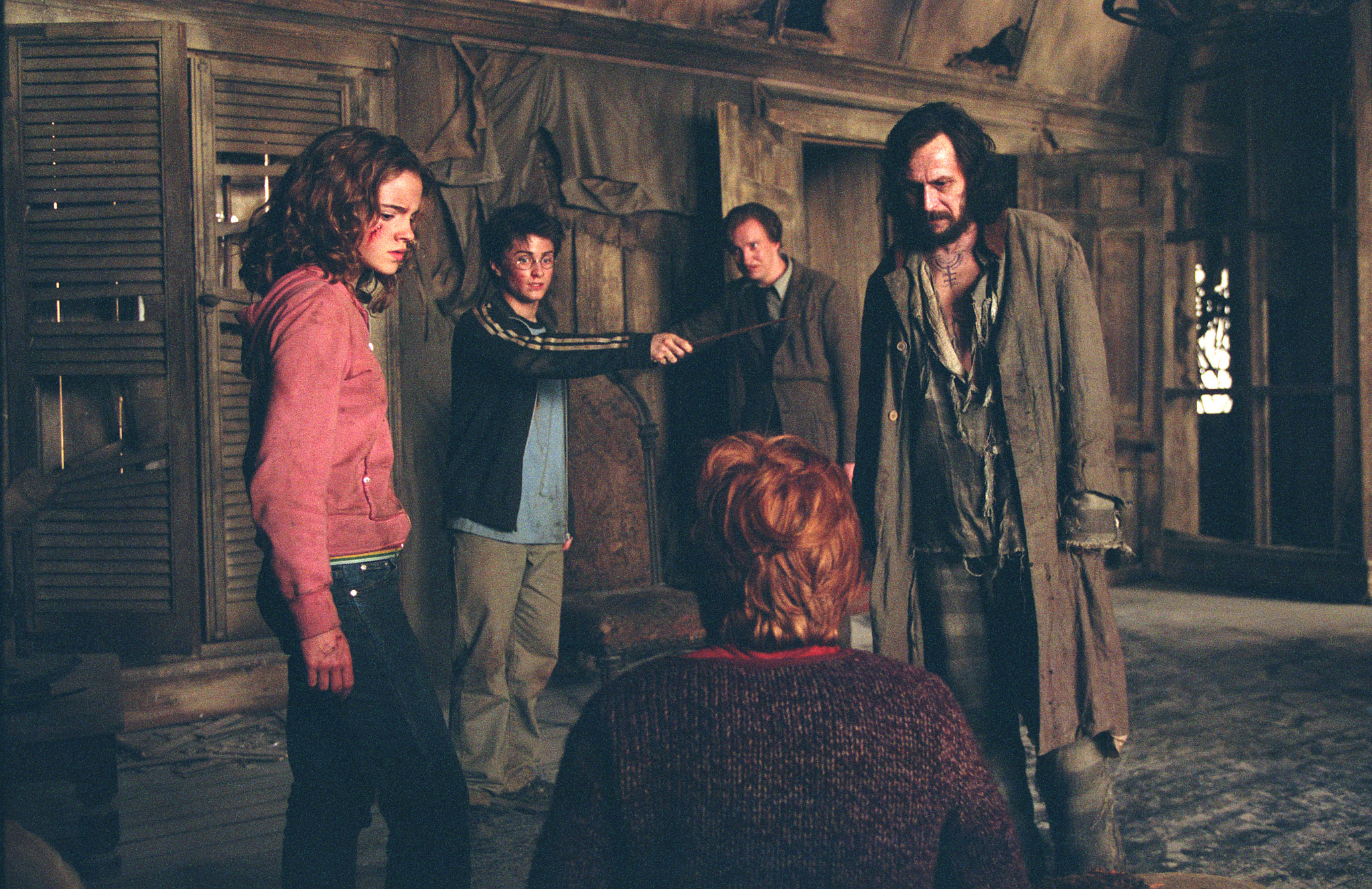 Still of Gary Oldman, David Thewlis, Rupert Grint, Daniel Radcliffe, Emma Watson and Sirius Black in Haris Poteris ir Azkabano kalinys (2004)