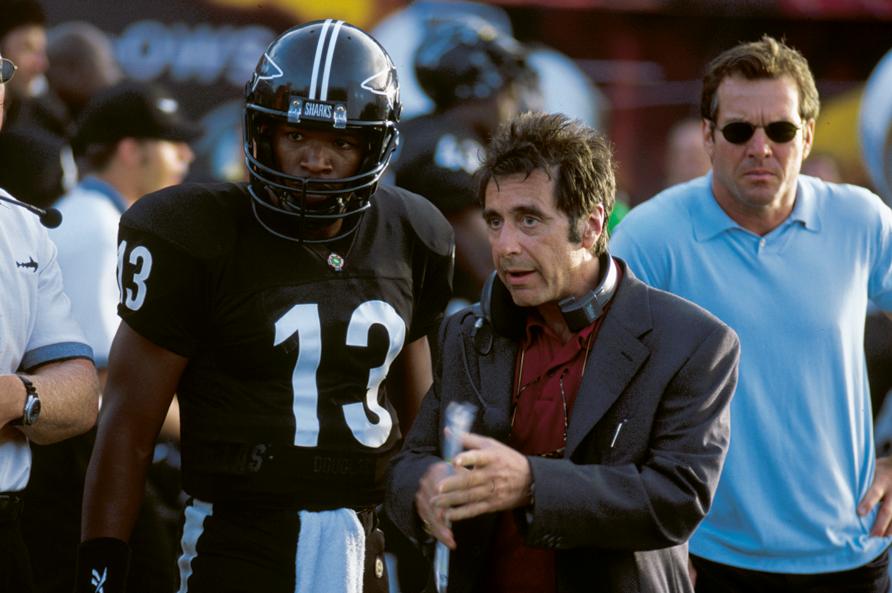 Tony, Willie and Cap on the sidelines