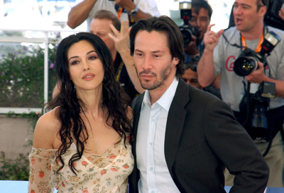 Keanu Reeves and Monica Bellucci at event of Matrica: Perkrauta (2003)