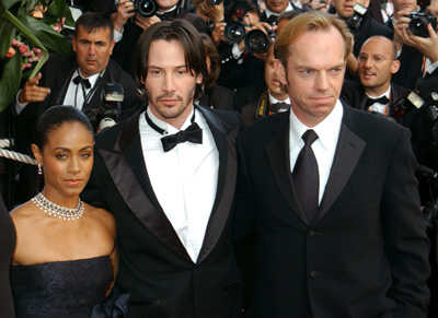 Keanu Reeves, Jada Pinkett Smith and Hugo Weaving at event of Matrica: Perkrauta (2003)