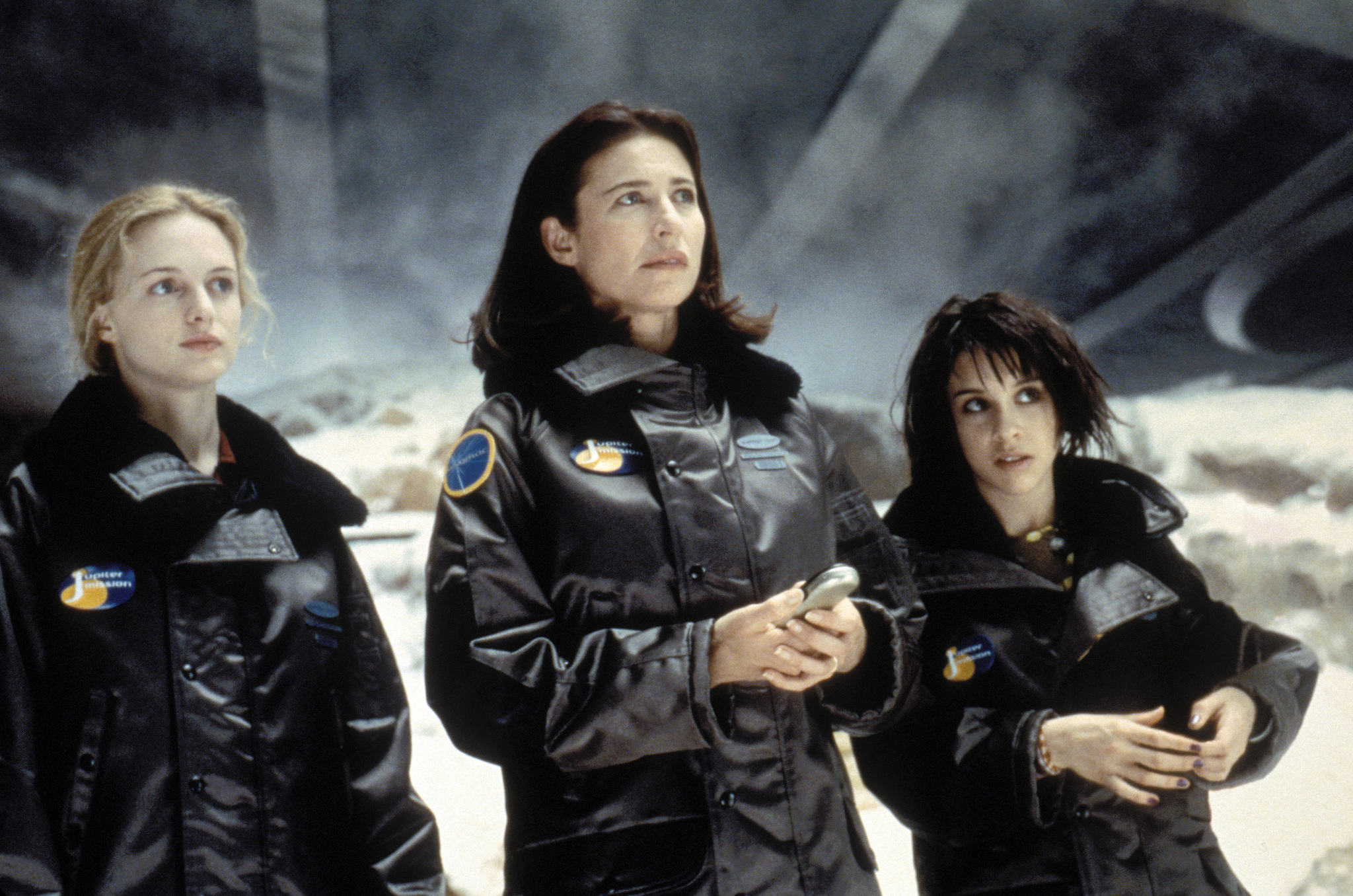 Still of Mimi Rogers, Lacey Chabert and Heather Graham in Lost in Space (1998)