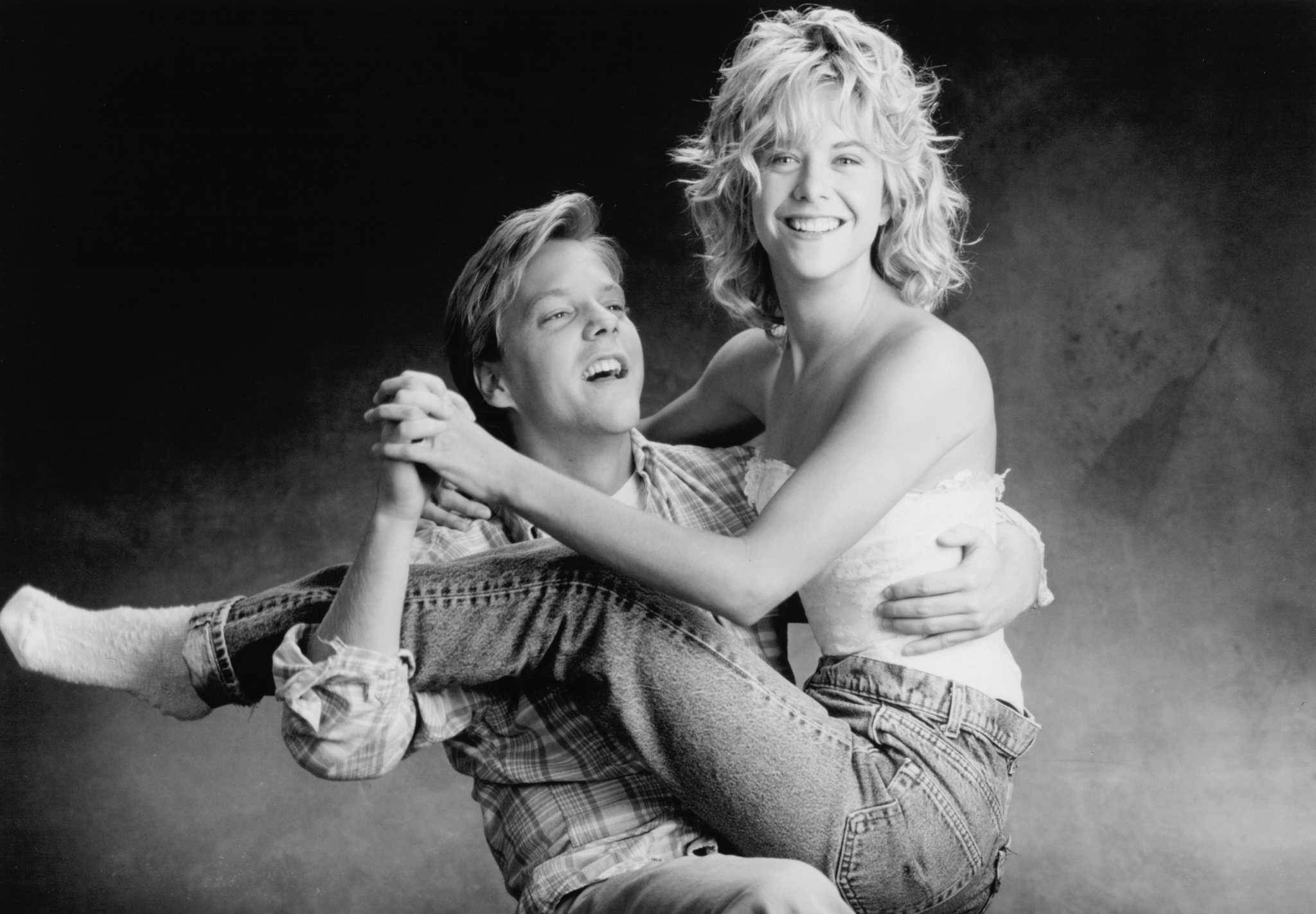 Still of Meg Ryan and Kiefer Sutherland in Promised Land (1987)