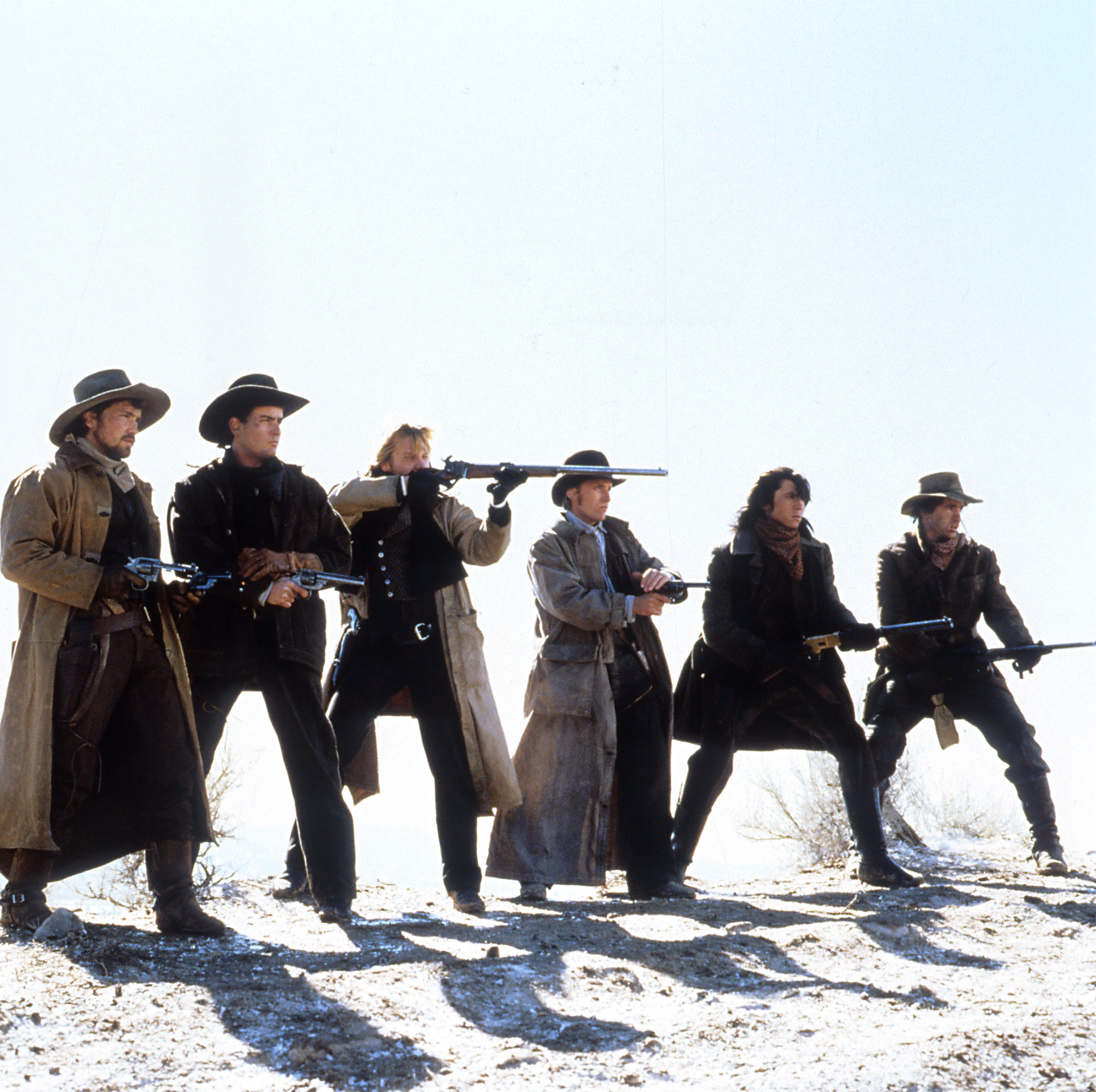 Still of Charlie Sheen, Emilio Estevez, Kiefer Sutherland and Lou Diamond Phillips in Young Guns (1988)