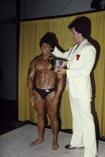 Sylvester Stallone at a bodybuilding competition