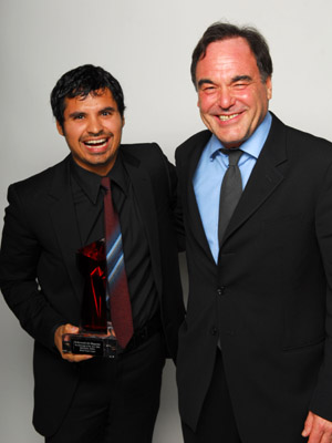 Oliver Stone and Michael Peña