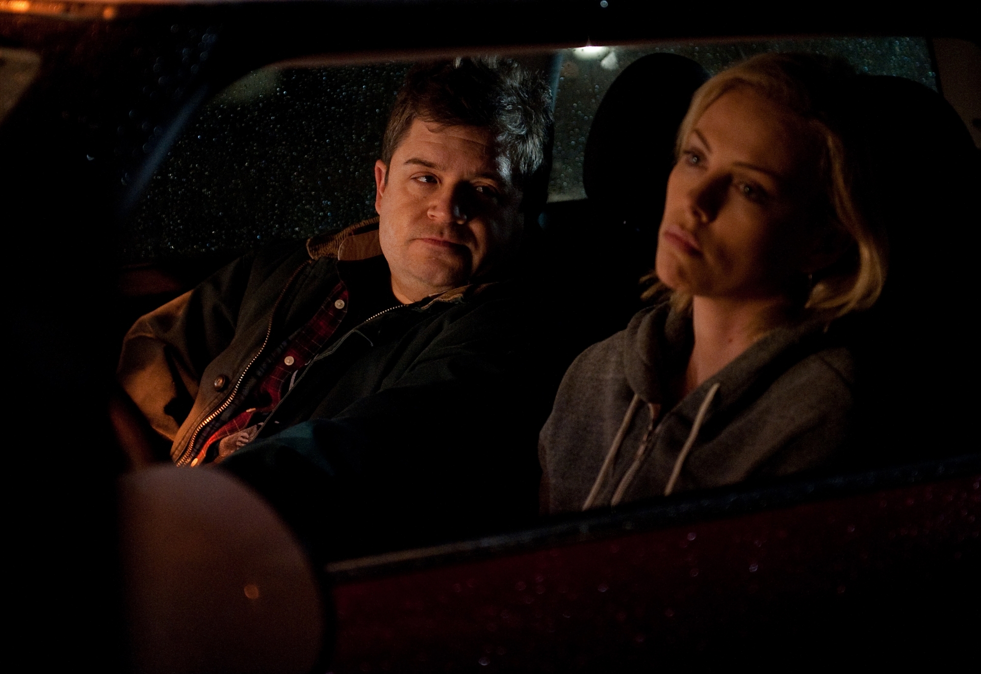 Still of Charlize Theron and Patton Oswalt in Young Adult (2011)