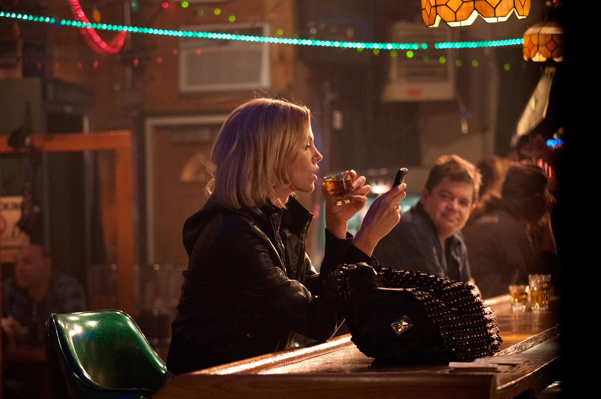 Still of Charlize Theron and Patton Oswalt in Young Adult (2011)