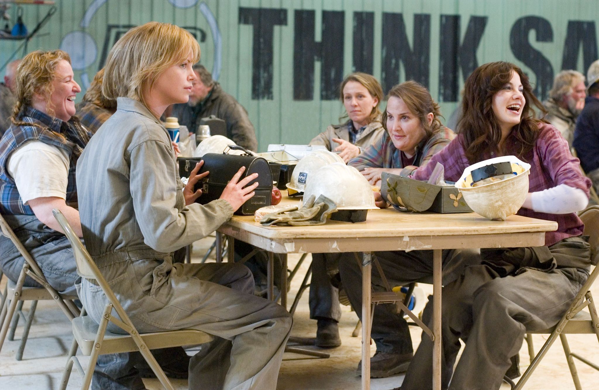 Still of Charlize Theron, Frances McDormand, Rusty Schwimmer, Jillian Armenante and Michelle Monaghan in North Country (2005)