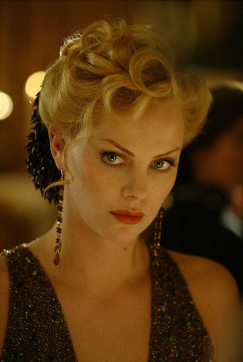 Still of Charlize Theron in Head in the Clouds (2004)