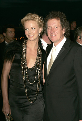 Charlize Theron and Geoffrey Rush at event of The Life and Death of Peter Sellers (2004)