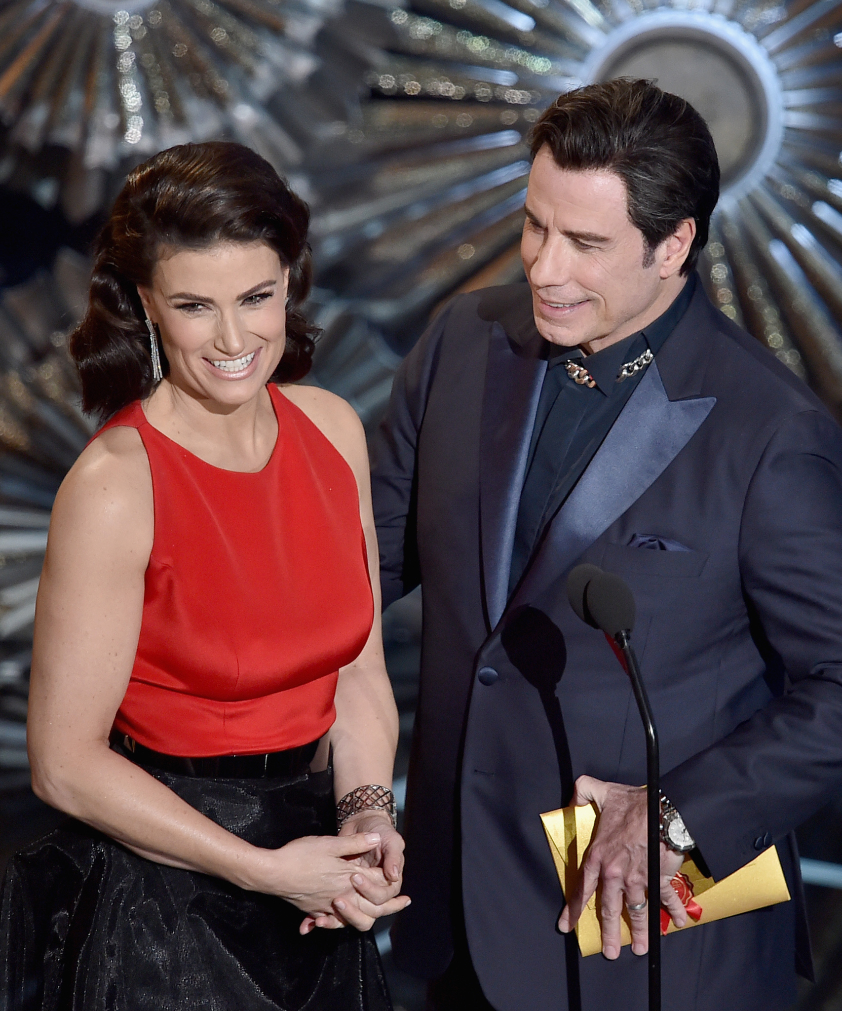 John Travolta and Idina Menzel at event of The Oscars (2015)