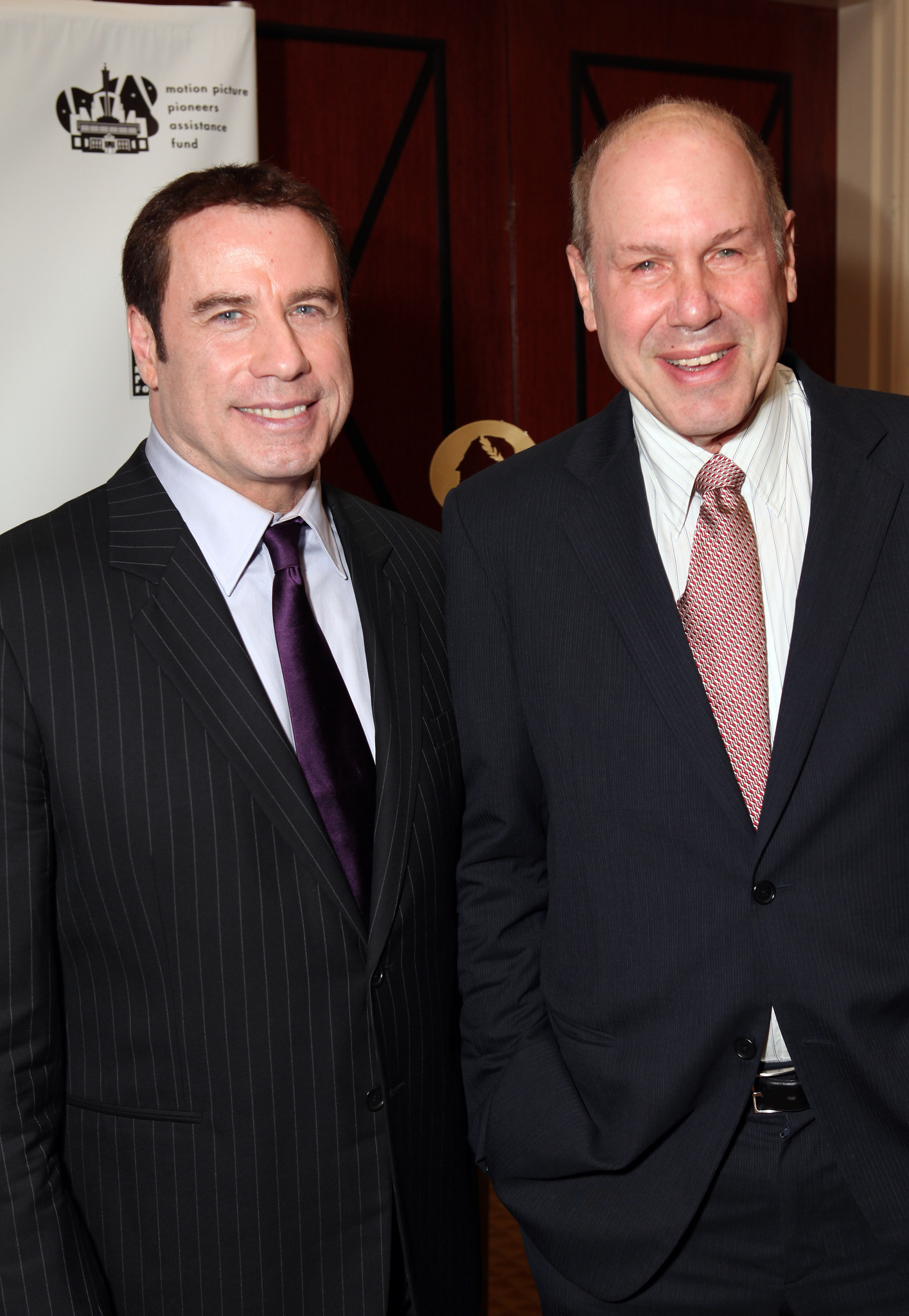 John Travolta and Michael Eisner