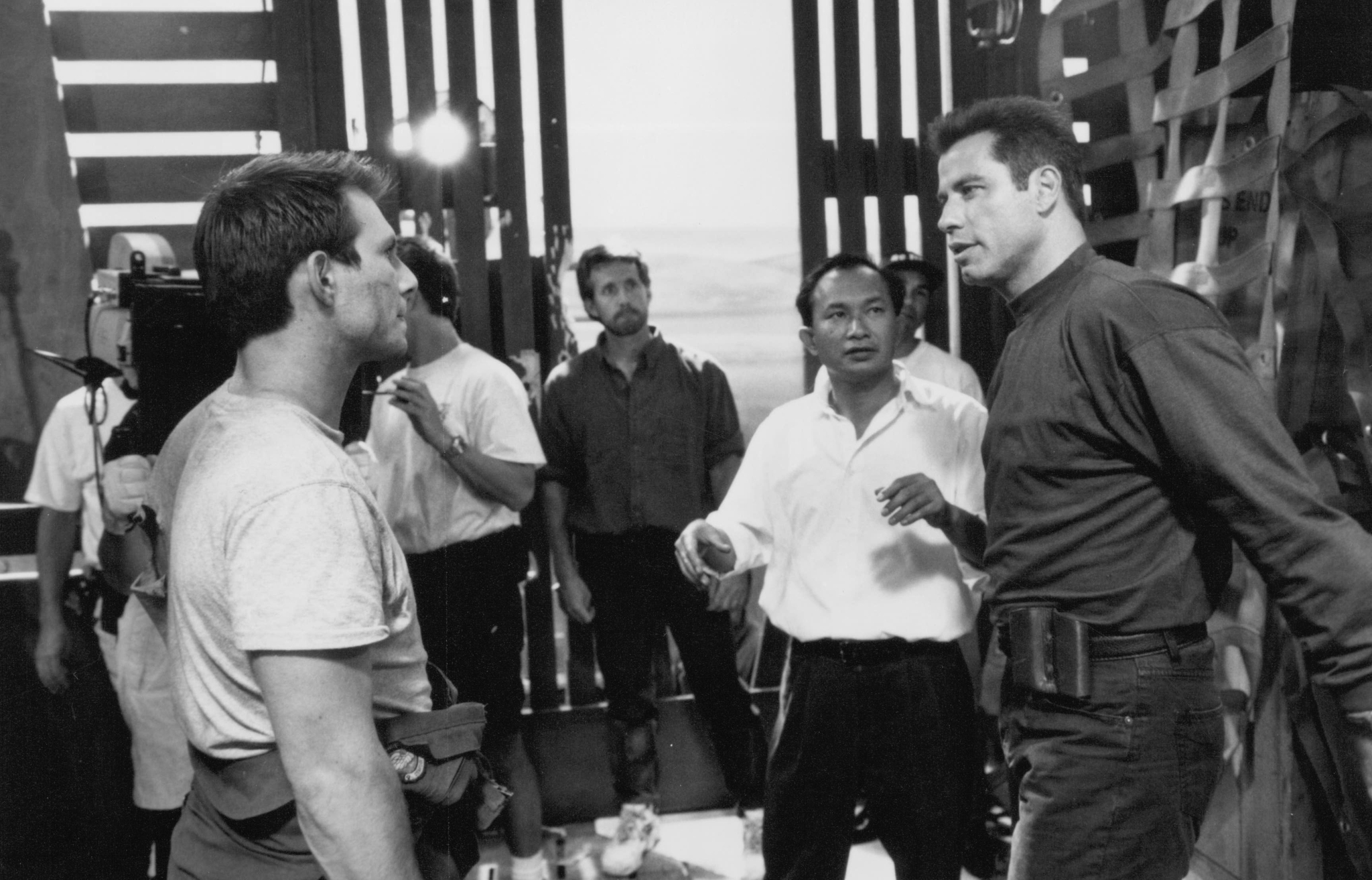 Still of Christian Slater, John Travolta and John Woo in Broken Arrow (1996)