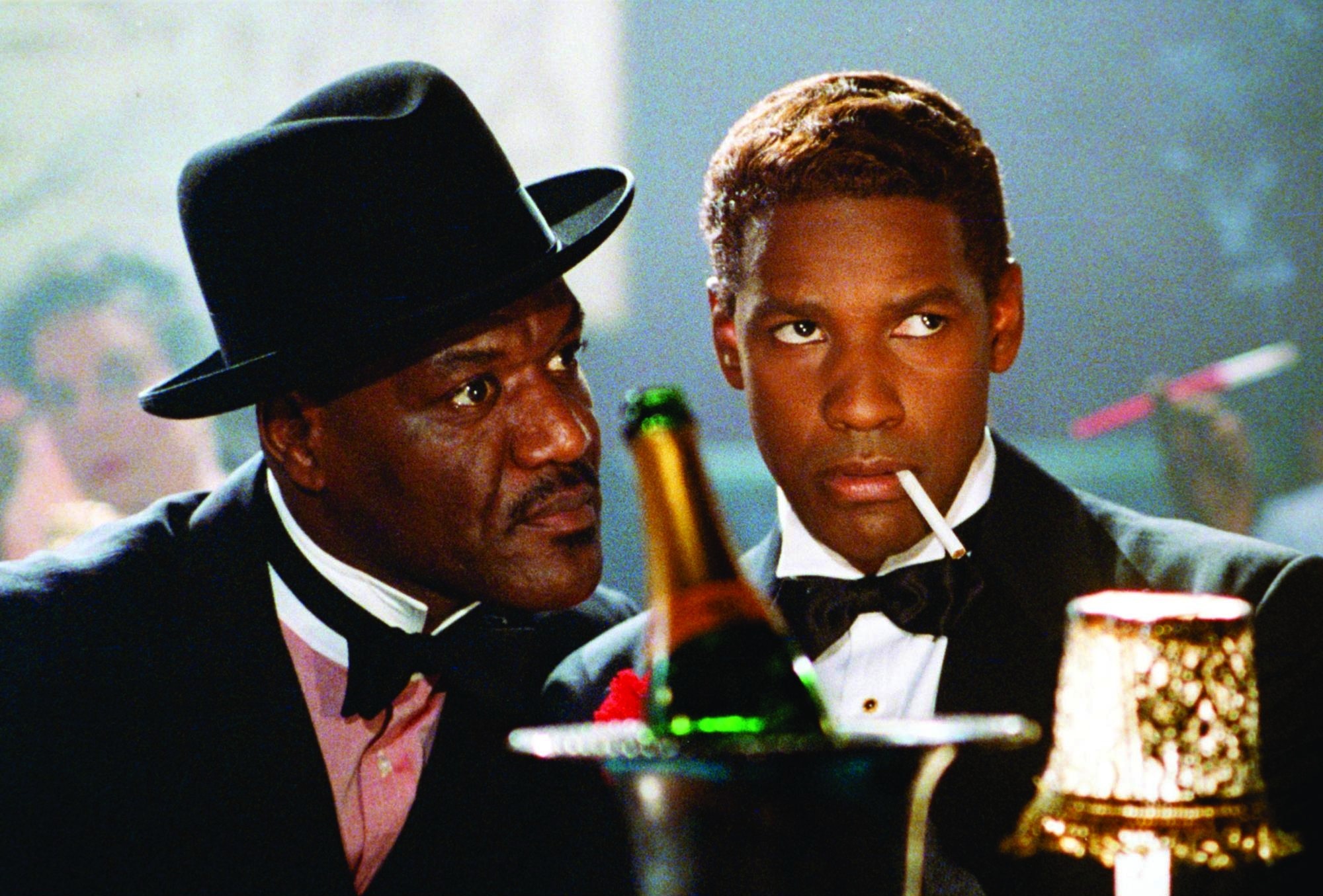 Still of Denzel Washington and Delroy Lindo in Malcolm X (1992)