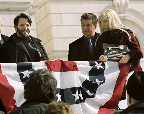 Steven (Matthew Broderick, left), Joe (Alec Baldwin, center) and leading lady Emily French (Toni Collette, right) accept the key to Providence, Rhode Island as they begin production on the film, Arizona.