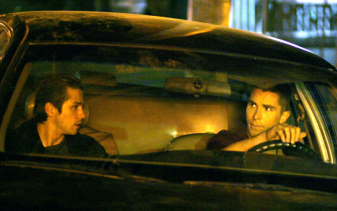 Still of Christian Bale and Freddy Rodríguez in Harsh Times (2005)